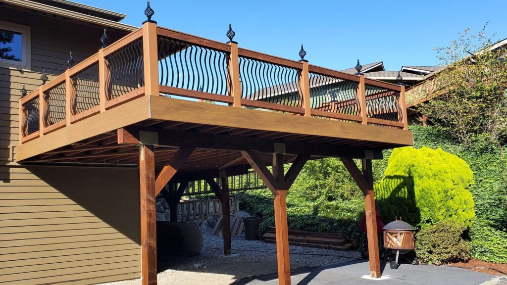 Elevated wood deck with decorative metal balusters