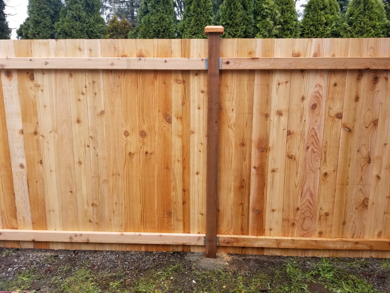 Cedar fence installation by Goodrow's