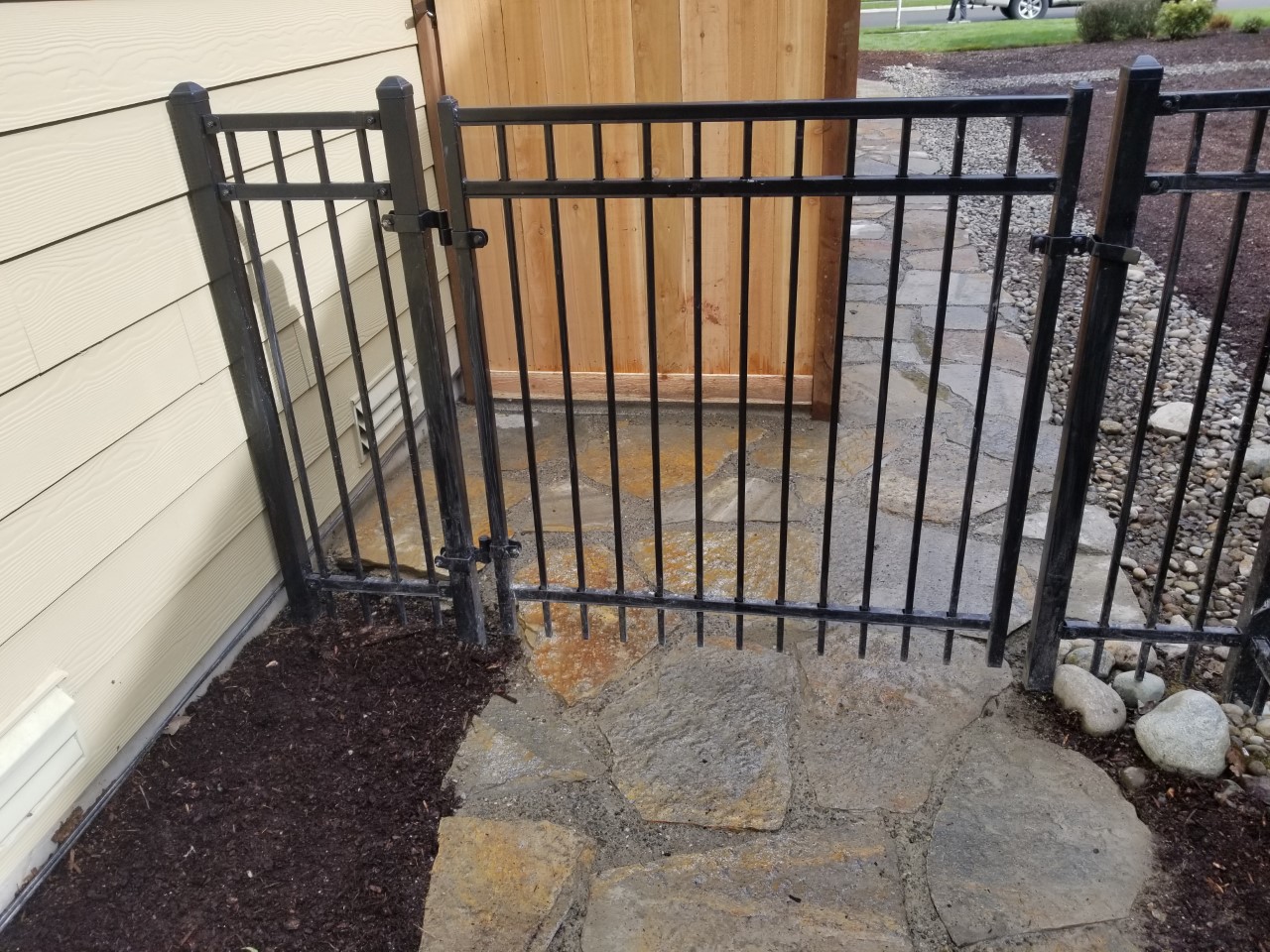Iron fence installation by Goodrow's