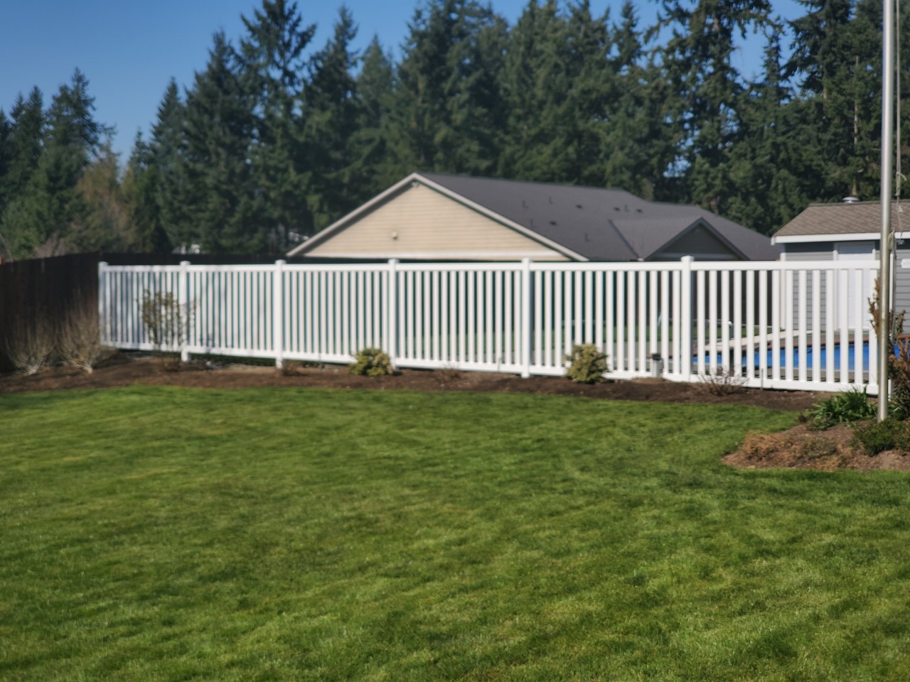 Vinyl fence by Goodrow's
